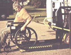 Disability Insurance - man in wheelchair using a lift