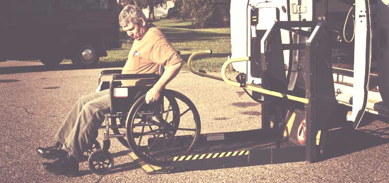 Disability Insurance - man in wheelchair using a lift