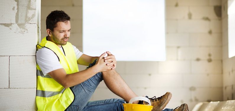 worker's compensation - Man with injured knee