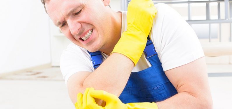 worker's compensation - Man with injured elbow