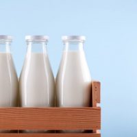 current milk prices - milk bottles in a crate