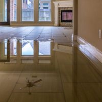 water covering part of floor in a home