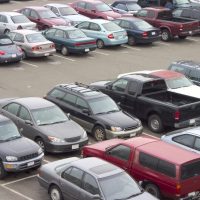 parking lot with different types of vehicles