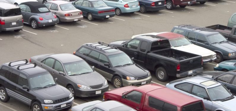 parking lot with different types of vehicles