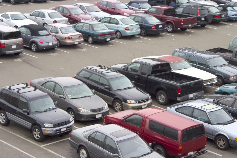 parking lot with different types of vehicles Ruhl Insurance