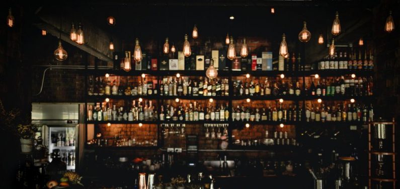 shelves of liquor in a bar