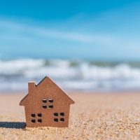 little wooden house on the sand