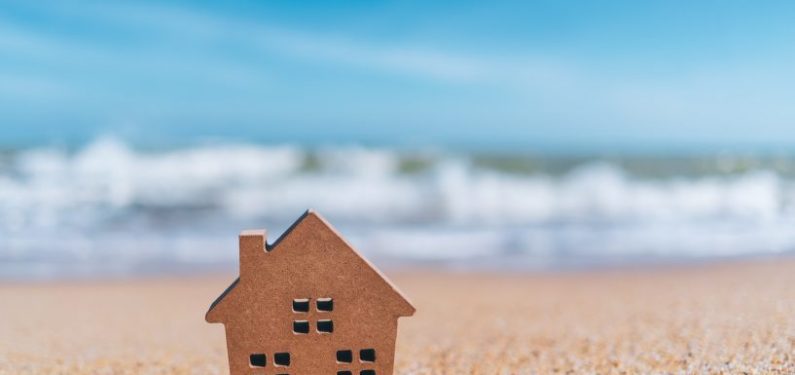 little wooden house on the sand
