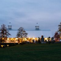 view of barn wedding from a distance at night
